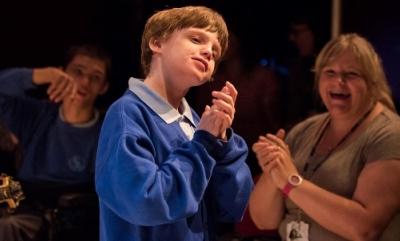 A young boy participating in a disability arts workshop at the Phoenix Theatre.