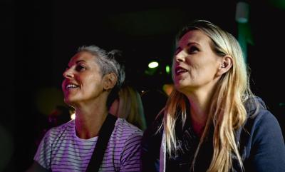 2 ladies enjoying the live music as the 2022 Phoenix Arts beer festival.