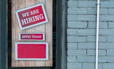 A picture of a "We are hiring" sign