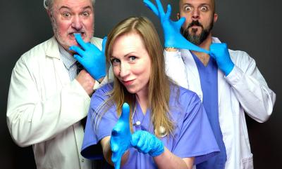 Three people dressed as doctors