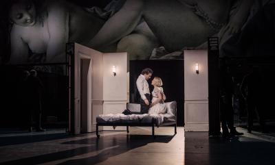 A man and a woman on a bed